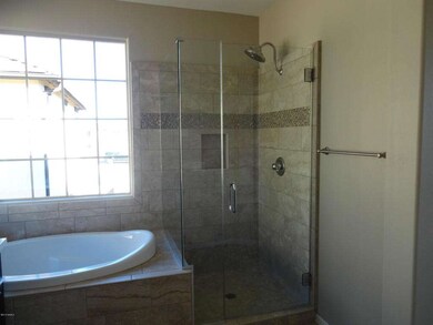Master Bathroom features Custom Tile