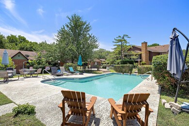 Community pool with a patio area