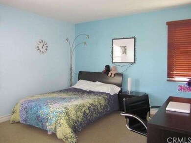 One of two secondary bedrooms upstairs