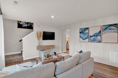 Living room featuring wood-type flooring