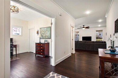 Foyer view into the office or possible 6th bedroom, the door to the 6X5 half bathroom and into the living room