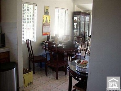 Dining Area is light and airy with access to rear 