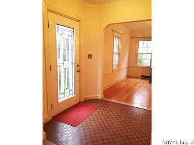 Foyer. Note new door which lets the light stream i