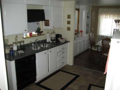 Kitchen has also been updated and colors blend sea