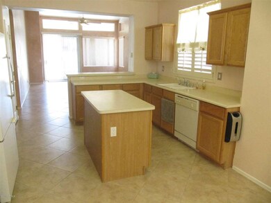 Kitchen opens to living area