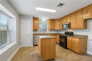 Kitchen with roll around island.