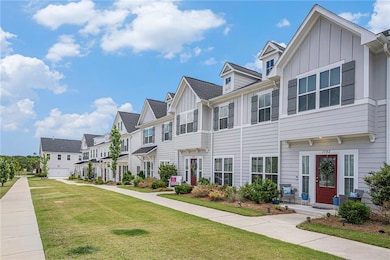 Sidewalk view of these gorgeous townhomes.