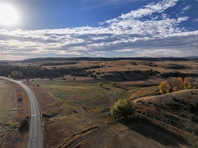 Bird's eye view with a mountain view and a rural v