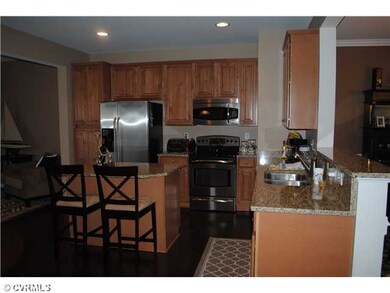 Kitchen - Breakfast bar/hardwood.