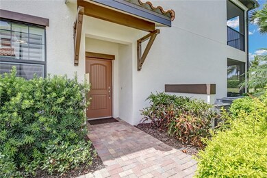 Private side entry door surrounded by lots of foli