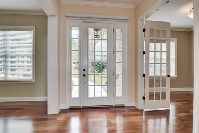 Foyer view open to dining and office