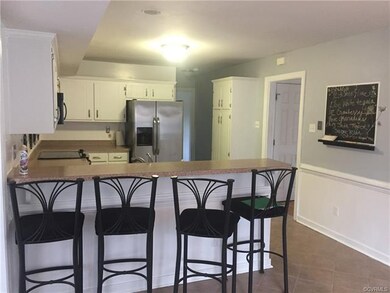 Open & Bright Kitchen with Informal Bar Area to Ga