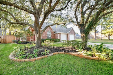 Another view of the front elevation and landscaping of this nice home!