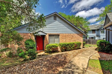 Bungalow-style house featuring brick siding and f