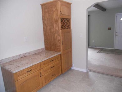Kitchen. This wall of cabinets/wine rack is remova