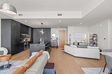 Living area featuring light wood-style flooring, 