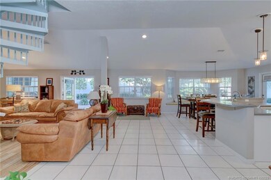 Open concept living areas with pool access and vie