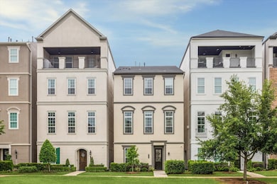 Distinctive stucco façade complements the refined,