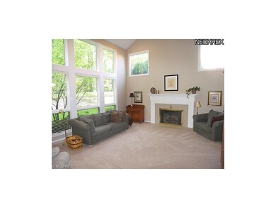 Gorgeous two story room with wood burning fireplac