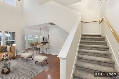 Open floor plan with soaring ceilings!