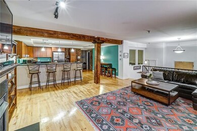 View of kitchen from living area.  Awesome open fl