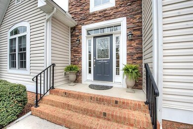 Beautiful stonework surrounding the front entry wi