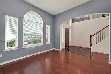 Alternate view of the dining area overlooking onto the front yard.