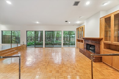 The living space is lined with a wall of sliding g