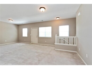 View from hallway towards dining room and entrance