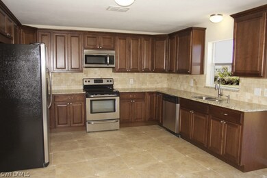 2426 NE Juanita Place, Cape Coral, FL 33909 - photo 6