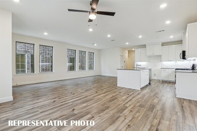 Featuring a wall of windows in the dining-kitchen 