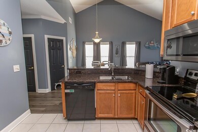 Kitchen featuring appliances with stainless steel 