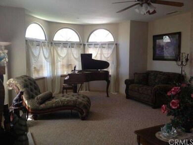 Large formal living area with room for a grand pia