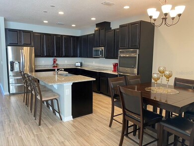 5201 Appenine Loop E, Saint Cloud, FL 34771 - photo 2