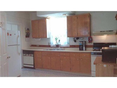 Kitchen. The spacious kitchen features newer tile 