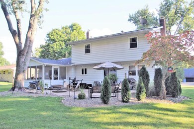 Rear view of home with fabulous outdoor space!