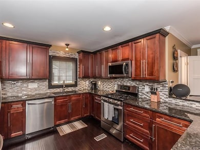 Step saver kitchen features stainless steel applia