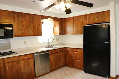 Kitchen area, overlooking backyard/deck area.