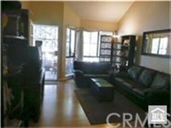 Laminate flooring in spacious downstairs living ar