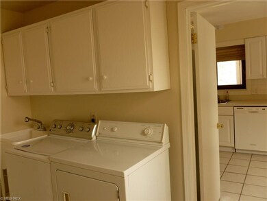 Laundry room is off the kitchen and has access to 