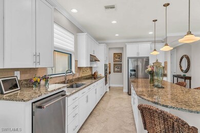 Kitchen featuring tasteful backsplash, stone count