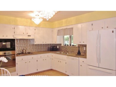 Updated Kitchen with newer hardware and fixtures.