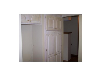 Many cabinets in the kitchen
