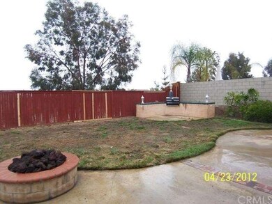 Back yard with fire pit and BBQ