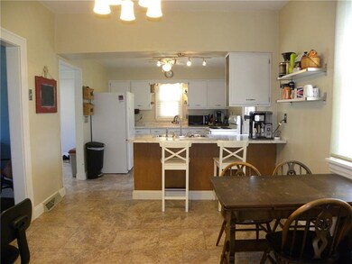 The kitchen is bright and open with eat-in area so
