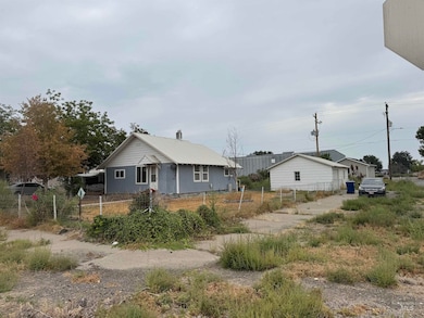 View of front of house featuring a fenced front yard