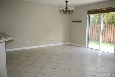 Family room off of Kitchen with outside access.