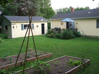 Backyard, Deck, Raised Beds and Garage