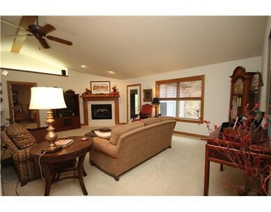 Living Room. Beautiful open floor plan with high vaulted ceilings and overhead lighting!