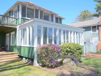 Side porches-one off the master bedroom and one of